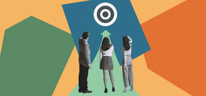 Two female and one male business owner pointing to a bullseye representing the different types of business models