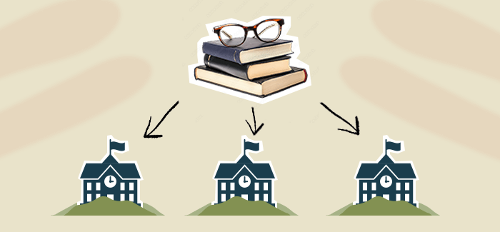 Three school houses and a stack of books and glasses on top to signify school superintendent