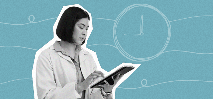 Healthcare management professional looking at an ipad