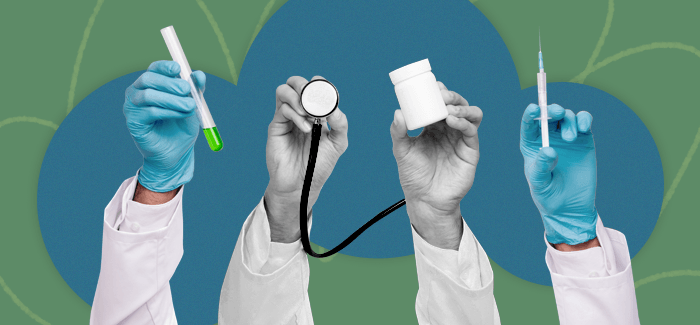 Four hands of nurses working in ambulatory care holding medical devices including a test tube, stethoscope, pill bottle and syringe.