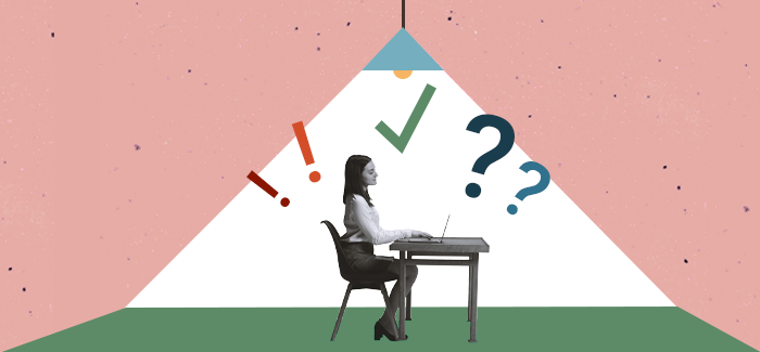 Woman on her laptop at a desk working on a professional certificate