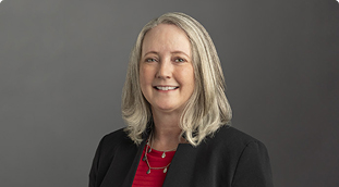 Samantha Dutton, PhD, LCSW, Lt Col (Ret), associate dean of Social Sciences at University of Phoenix