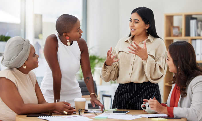 Group of business casual women in a discussion