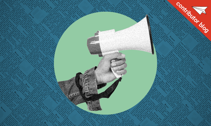 Hand holding megaphone