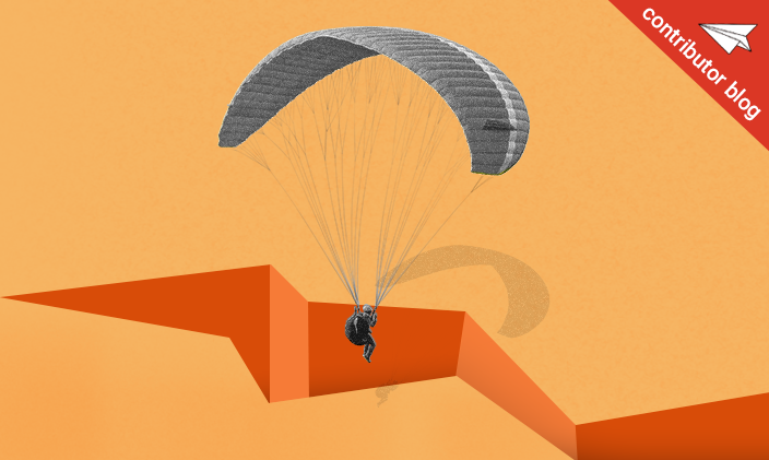 A person gliding down to earth via a parachute to signify rebounding