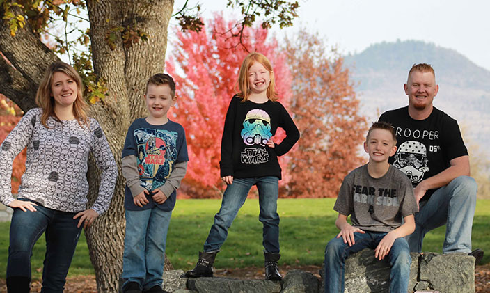 Will Irey and his family pose outside