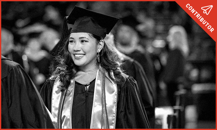 Graduate at commencement at University of Phoenix, in her cap and gown