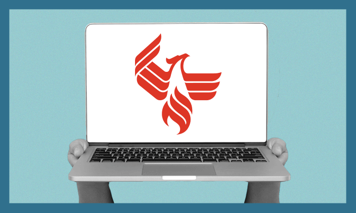 A laptop with the University of Phoenix logo of a phoenix on the screen