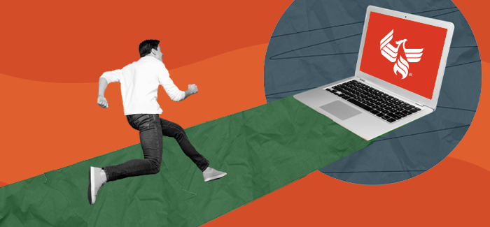 Man runs down a path toward a laptop in a mad dash to earn his bachelor’s degree completely online