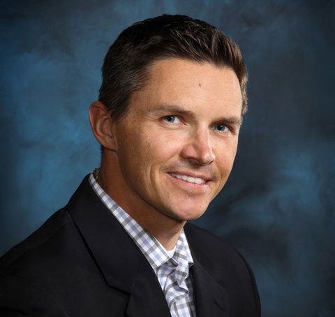 Headshot of Brian Dickinson