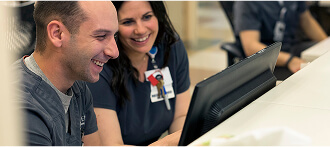 University of Phoenix graduates working in a hospital setting
