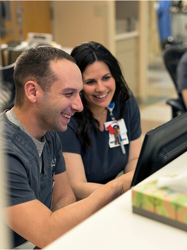 University of Phoenix graduates working in a hospital setting