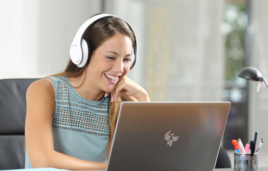Student smiling while receiving online support