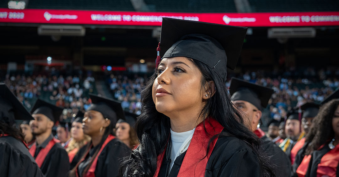 student savoring the moment at commencement