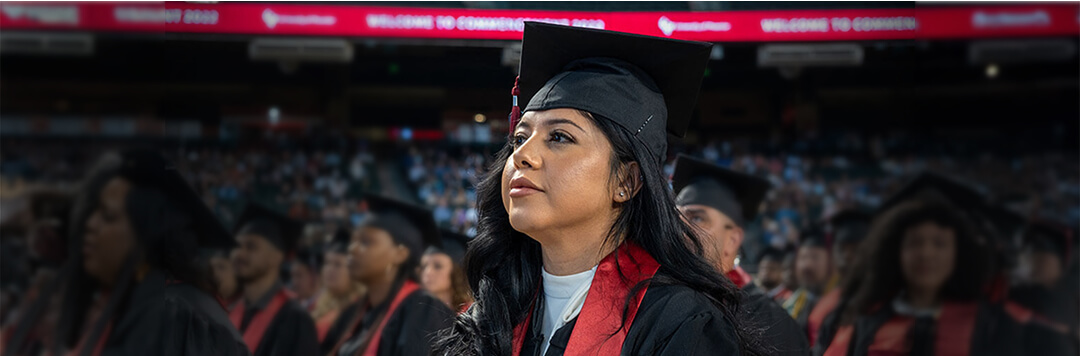 student savoring the moment at commencement