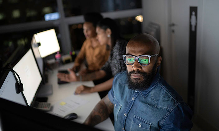 IT professionals in a computer lab