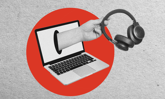 Open laptop in center of frame with a hand extending from screen. The hand is holding a pair of headphones.