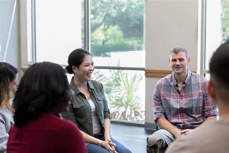 University of Phoenix military-affiliated students sitting together in a circle