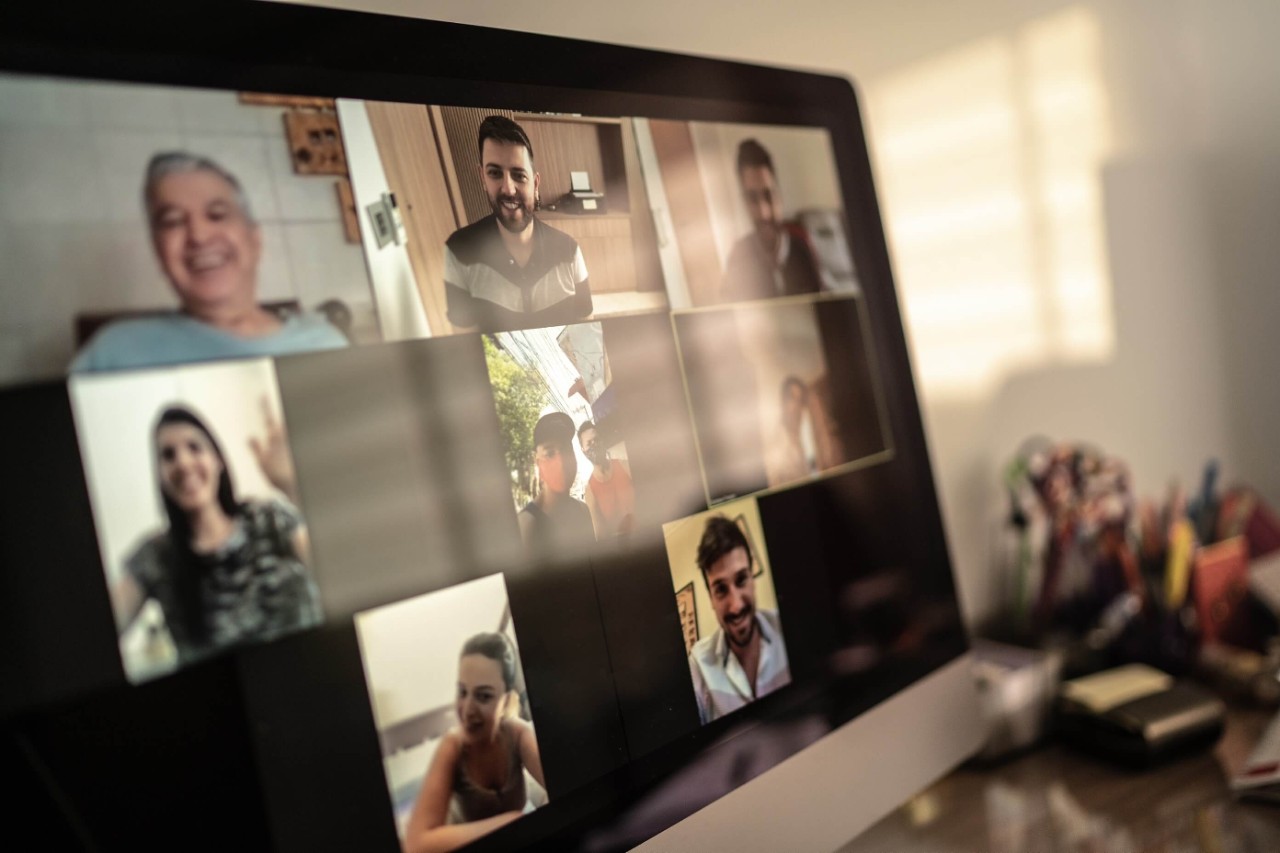A view of a laptop screen, showing a video conference call