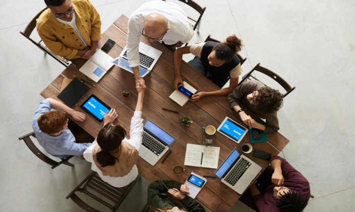 Team in a business organization working at a table