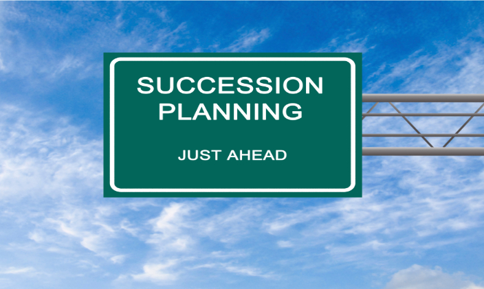 Highway sign with the words "Succession planning"