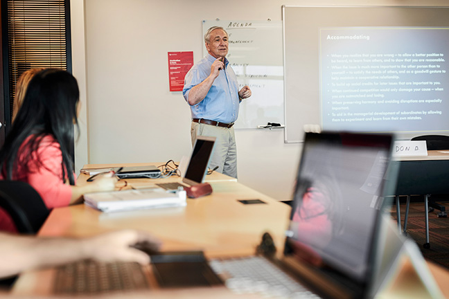 High school teacher leading a blended learning class