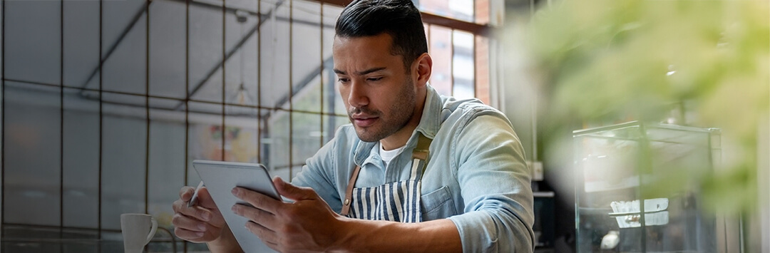 student reviewing scholarships online