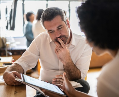 Professionals working on laptop