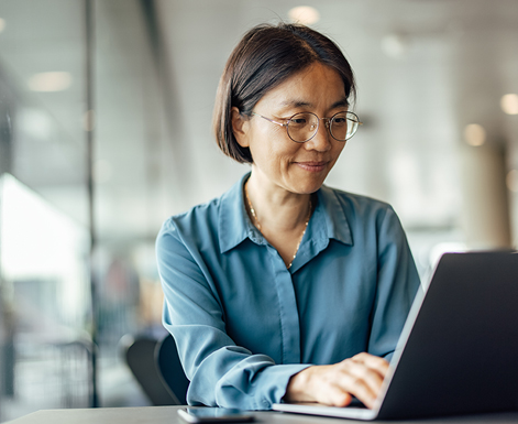 Professional woman working on laptop