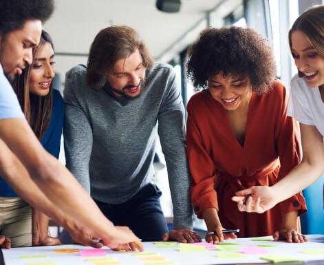 Group of employees learning new skills to grow company