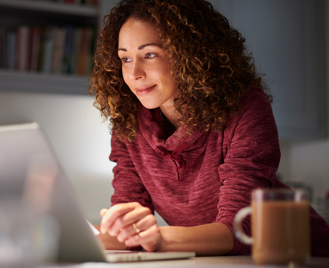 Woman completing HR training on computer