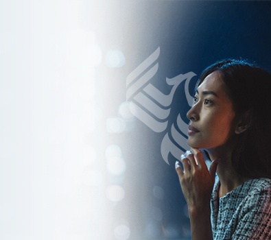 woman looking at IT data on a screen