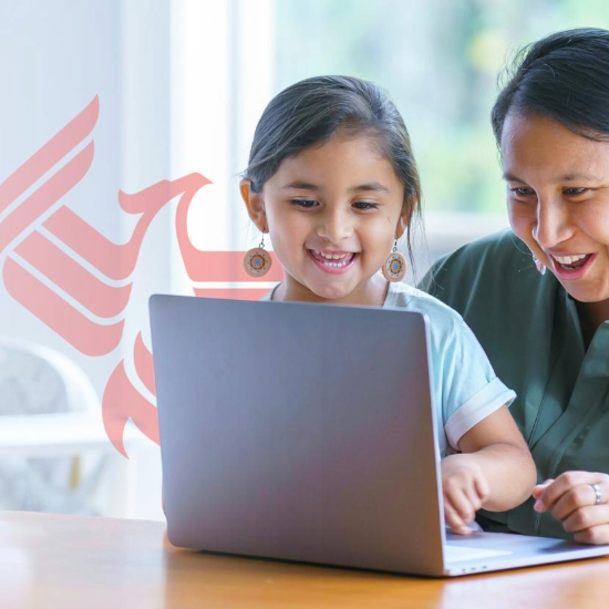woman and child looking at computer