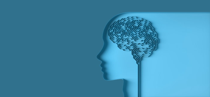 A silhouette in blue of a brain as a maze demonstrates how AI readiness is an important workforce skill